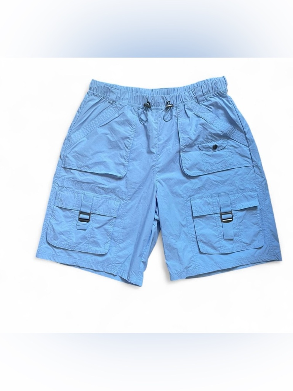 FP Movement by Free People blue cargo march on hike shorts in size medium NWOT